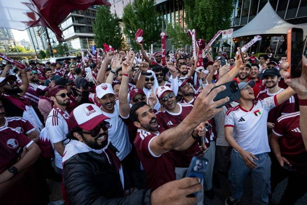 June 17, 2026, Vancouver, Bc, CANADA: Qatari fans chant before marching during a FIFA World Cup, WM, Weltmeisterschaft, Fussball rally in Vancouver, on Wednesday, June 17, 2026. Canada News - June 17, 2026  - ZUMAc35_ 20260617_zaf_c35_286 Copyright: xEthanxCairnsx