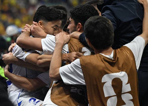 (260618) -- MEXICO CITY, June 18, 2026 -- Abbosbek Fayzullaev (1st L) of Uzbekistan celebrates his goal with teammates during the group K match between Uzbekistan and Colombia at the FIFA World Cup, WM, Weltmeisterschaft, Fussball 2026 in Mexico City, Mexico, June 17, 2026. ) (SP)MEXICO-MEXICO CITY-FOOTBALL-FIFA WORLD CUP-GROUP K-UZB VS COL WuxWei 