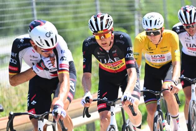 Tour de Suisse 2026 Stage 2 LOCARNO, SWITZERLAND - JUNE 18 : Politt Nils (GER) of UAE Team Emirates - XRG, Wellens Tim (BEL) of UAE Team Emirates - XRG, Pogacar Tadej (SLO) of UAE Team Emirates - XRG during stage 2 of the 89th edition of Tour de Suisse an UCI World Tour 2.UWT cycling road race stage for Men Elite of 157.7 km with start in Locarno and finish in Locarno on June 18, 2026 in Locarno, Switzerland, 18 06 2026 ( Motordriver Guy De Vuyst - Locarno Switzerland  Copyright: xVincentxKalutx