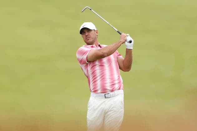 Brooks Koepka hits an approach shot on the 1st hole during the first round of the 126th U.S. Open Golf Championship at Shinnecock Hills Golf Club in Southampton, NY, on Thursday, June 18, 2026.  NYC20260618815 JOHNxANGELILLO