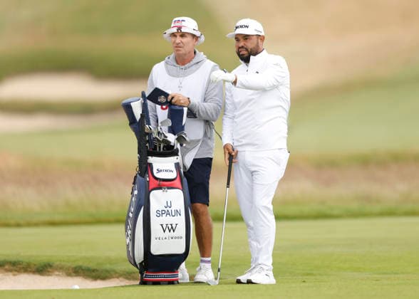 J.J. Spaun talks to his caddie on 1st fairway during the first round of the 126th U.S. Open Golf Championship at Shinnecock Hills Golf Club in Southampton, NY, on Thursday, June 18, 2026.  NYC20260618822 JOHNxANGELILLO