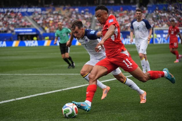 Switzerland v Bosnia and Herzegovina - FIFA World Cup, WM, Weltmeisterschaft, Fussball 2026 - Group B LOS ANGELES, UNITED STATES - JUNE 18: Dan Ndoye (11) of Switzerland in action against Amar Dedic (7) of Bosnia and Herzegovina during the 2026 FIFA World Cup First Stage Group B match between Switzerland and Bosnia and Herzegovina at the Los Angeles Stadium (SoFi Stadium) in Inglewood, California, United States on June 18, 2026. Tayfun Coskun Anadolu California United States. Editorial use only. Please get in touch for any other usage.  Copyright: x2026xAnadoluxTayfunxCoskunx