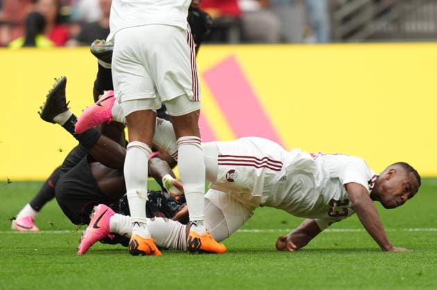Canada v Qatar - FIFA World Cup, WM, Weltmeisterschaft, Fussball 2026 - Group B VANCOUVER, CANADA - JUNE 18: Assim Madibo (23) of Qatar falls to the ground during the 2026 FIFA World Cup First Stage Group B match between Canada and Qatar at BC Place Stadium in Vancouver, Canada on June 18, 2026. Ercin Erturk Anadolu British Columbia Canada. Editorial use only. Please get in touch for any other usage.  Copyright: x2026xAnadoluxErcinxErturkx