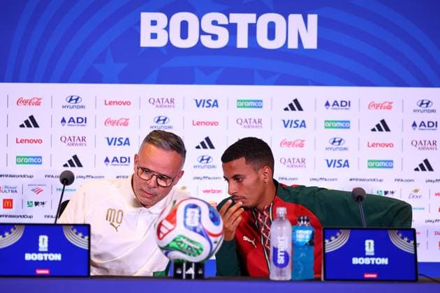 Mohamed Ouahbi head coach of Morocco and Azzedine Ounahi of Morocco Morocco press conference, PK, Pressekonferenz 2026 FIFA World Cup, WM, Weltmeisterschaft, Fussball Football, Boston Stadium, Foxborough, Massachusetts, USA - 18 Jun 2026Charlotte Atrium Health Performance Park United States of America EDITORIAL USE ONLY No use with unauthorised audio, video, data, fixture lists, club league logos or live services. Online in-match use limited to 120 images, no video emulation. No use in betting, games or single club league player publications.  Copyright: xMichaelxZemanek Shutterstockx 16934884c
