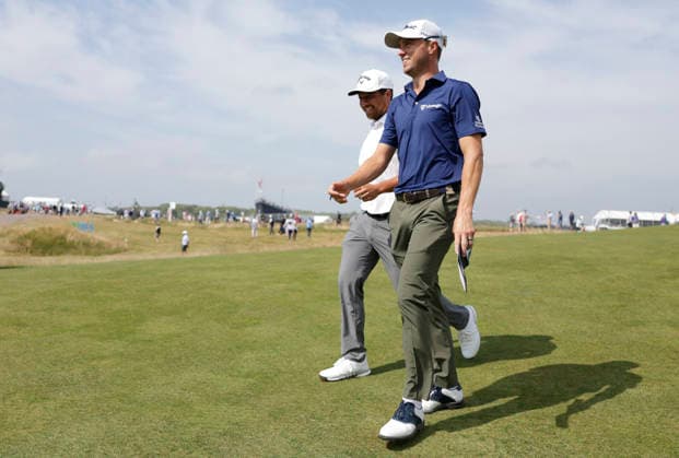 Justin Thomas and Xander Schauffele walk off the 1st green during the first round of the 126th U.S. Open Golf Championship at Shinnecock Hills Golf Club in Southampton, NY, on Thursday, June 18, 2026.  NYC20260618913 COREYxSIPKIN