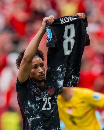 FIFA World Cup, WM, Weltmeisterschaft, Fussball 2026 - Group B - Canada vs Qatar Canada midfielder Nathan-Dylan Saliba celebrates his goal by holding up the jersey of seriously injured teammate midfielder Ismael Kone in the second half of the FIFA World Cup 2026 group stage match between Canada and Qatar in Vancouver, Canada, 18 June 2026. VANCOUVER Canada  Copyright: xBOBxFRIDx