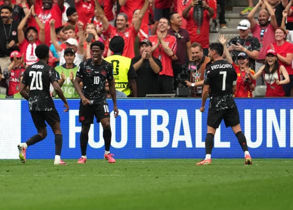 (260619) -- VANCOUVER, June 19, 2026 -- Jonathan David (C) of Canada celebrates his goal during the group B match between Canada and Qatar at the 2026 FIFA World Cup, WM, Weltmeisterschaft, Fussball at BC Place Vancouver in Vancouver, Canada, June 18, 2026. ) (SP)CANADA-VANCOUVER-FOOTBALL-FIFA WORLD CUP-GROUP B-CAN VS QAT MengxYongmin 
