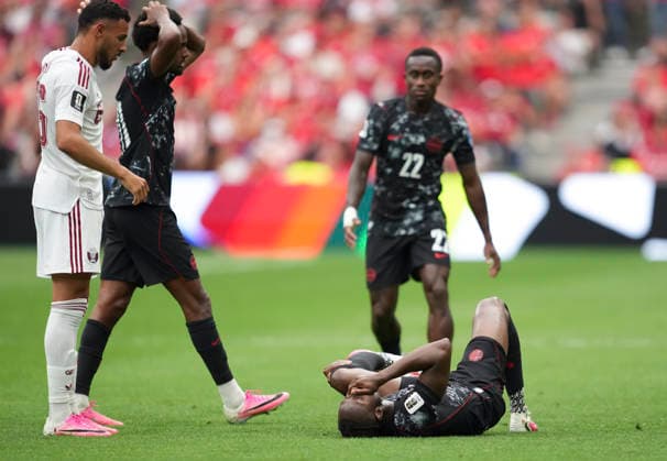 (260619) -- VANCOUVER, June 19, 2026 -- Ismael Kone (bottom) of Canada lies on the field after being injured during the group B match between Canada and Qatar at the 2026 FIFA World Cup, WM, Weltmeisterschaft, Fussball at BC Place Vancouver in Vancouver, Canada, June 18, 2026. ) (SP)CANADA-VANCOUVER-FOOTBALL-FIFA WORLD CUP-GROUP B-CAN VS QAT MengxYongmin 