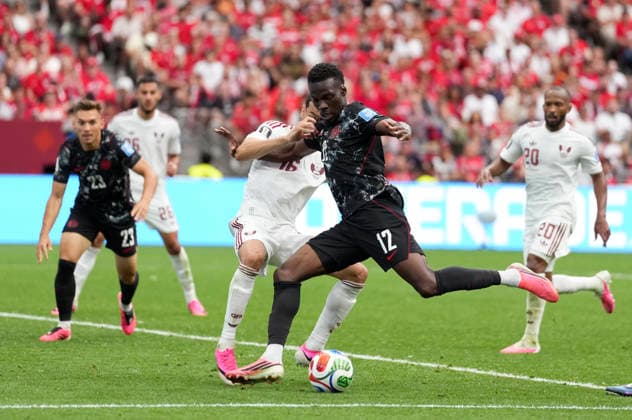 (260619) -- VANCOUVER, June 19, 2026 -- Tani Oluwaseyi (front) of Canada shoots during the group B match between Canada and Qatar at the 2026 FIFA World Cup, WM, Weltmeisterschaft, Fussball at BC Place Vancouver in Vancouver, Canada, June 18, 2026. ) (SP)CANADA-VANCOUVER-FOOTBALL-FIFA WORLD CUP-GROUP B-CAN VS QAT MengxYongmin 