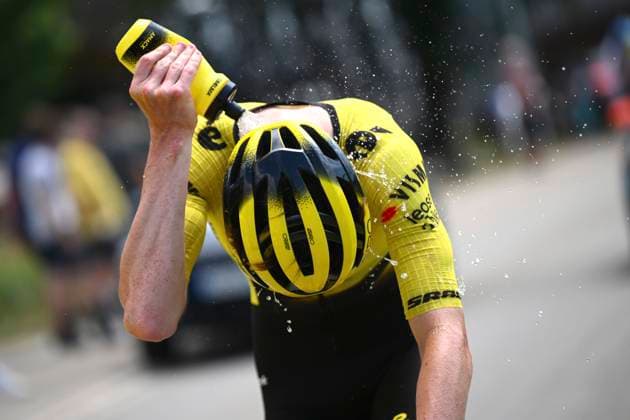 Tour de Suisse 2026 Stage 3 BAD RAGAZ, SWITZERLAND - JUNE 19 : rider of team Visma I Lease a Bike cooling off with his water bottle during stage 3 of the 89th edition of Tour de Suisse an UCI World Tour 2.UWT cycling road race stage for Men Elite of 157.9 km with start in Bad Ragaz and finish in Bad Ragaz on June 19, 2026 in Bad Ragaz, Switzerland, 19 06 2026 ( Motordriver Guy De Vuyst - Bad Ragaz Switzerland  Copyright: xVincentxKalutx