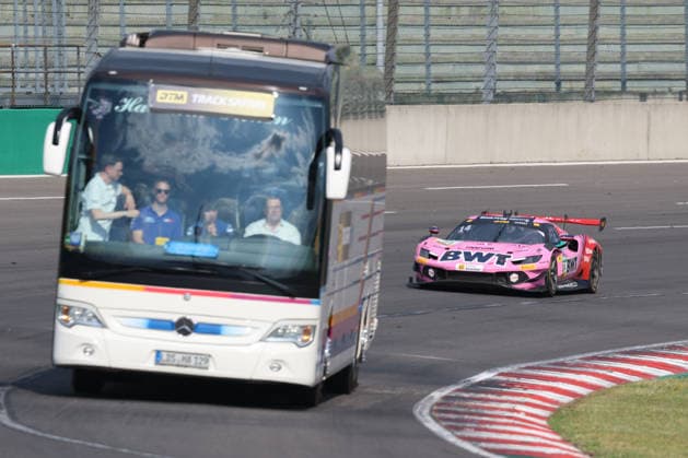 Track Safari - Matteo Cairoli (I Emil Frey Racing 14), Ferrari 296 GT3 Evo Overtakes coach with spectators, DTM (German Touring Car Championship) - Round 3 - Free Practice, DEKRA Lausitzring on 19.06.2026. Brandenburg Deutschland Copyright: xO.Frankex