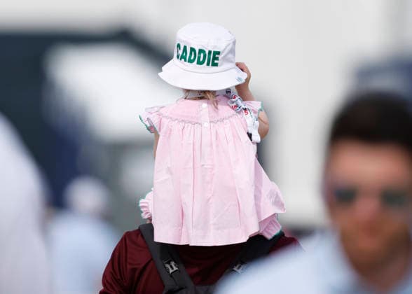 A young golf fan wears a caddie hat during the second round of the 126th U.S. Open Golf Championship at Shinnecock Hills Golf Club in Southampton, NY, on Friday, June 19, 2026.  NYC20260619819 JOHNxANGELILLO