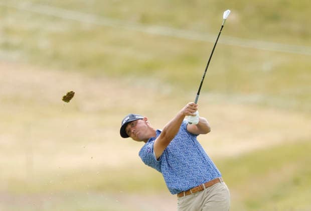 Max McGreevy hits an approach shot on the 1st fairway during the second round of the 126th U.S. Open Golf Championship at Shinnecock Hills Golf Club in Southampton, NY, on Friday, June 19, 2026.  NYC20260619820 JOHNxANGELILLO