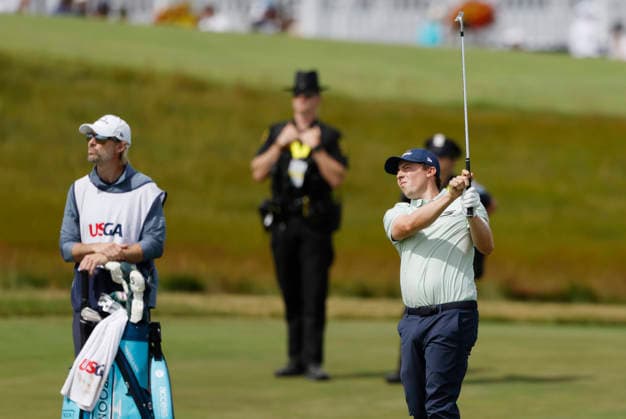 Matt Fitzpatrick of England hits an approach shot to the 9th green during the second round of the 126th U.S. Open Golf Championship at Shinnecock Hills Golf Club in Southampton, NY, on Friday, June 19, 2026.  NYC20260619823 JOHNxANGELILLO
