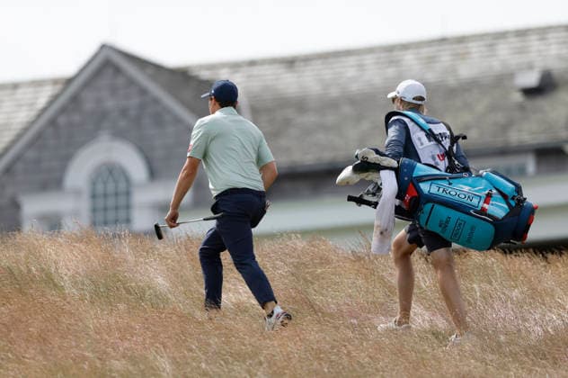 Matt Fitzpatrick of England and his caddie walk up to the 9th green during the second round of the 126th U.S. Open Golf Championship at Shinnecock Hills Golf Club in Southampton, NY, on Friday, June 19, 2026.  NYC20260619825 JOHNxANGELILLO