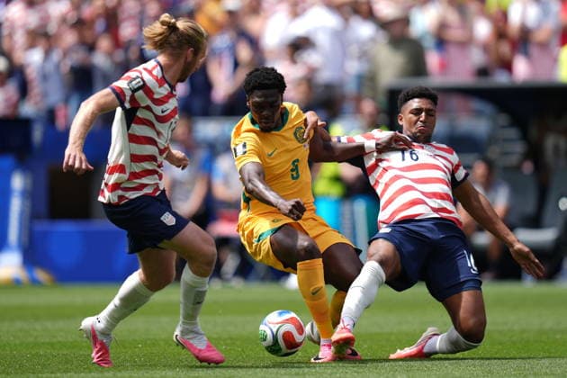 USA v Australia - FIFA World Cup, WM, Weltmeisterschaft, Fussball 2026 - Group D SEATTLE, USA - JUNE 19: Mohamed Toure (9) of Australia in action against Alex Freeman (16) of USA during the 2026 FIFA World Cup First Stage Group D match between USA and Australia at Lumen Field (Seattle Stadium) in Seattle, Washington, United States on June 19, 2026. Ercin Erturk Anadolu Washington United States. Editorial use only. Please get in touch for any other usage.  Copyright: x2026xAnadoluxErcinxErturkx