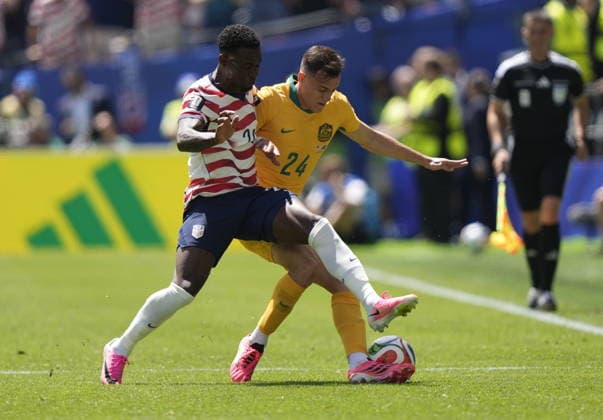 FIFA World Cup, WM, Weltmeisterschaft, Fussball 2026 - Group D - USA vs Australia Folarin Balogun of USA (L) and Paul Okon-Engstler of Australia in action during the FIFA World Cup 2026 group stage match USA against Australia, in Seattle, USA, 19 June 2026. SEATTLE United States  Copyright: xSTEPHANxBRASHEARx