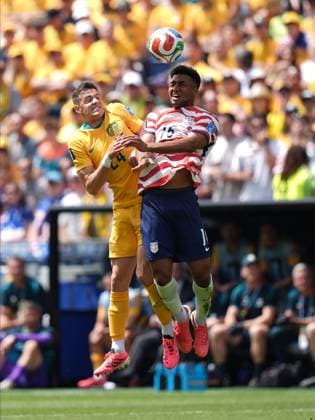 USA v Australia - FIFA World Cup, WM, Weltmeisterschaft, Fussball 2026 - Group D SEATTLE, USA - JUNE 19: Cristian Roldan (15) of USA in action against Paul Okon-Engstler (24) of Australia during the 2026 FIFA World Cup First Stage Group D match between USA and Australia at Lumen Field (Seattle Stadium) in Seattle, Washington, United States on June 19, 2026. Ercin Erturk Anadolu Washington United States. Editorial use only. Please get in touch for any other usage.  Copyright: x2026xAnadoluxErcinxErturkx