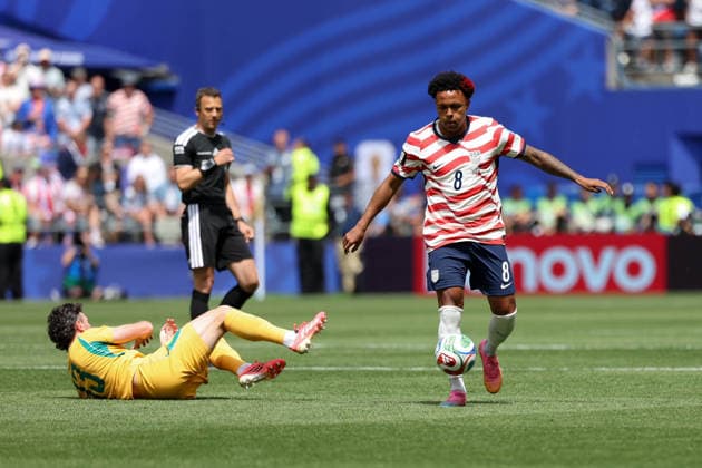 June 19, 2026, Seattle, Washington, USA: United States of America midfielder Weston McKennie (8) drives past Australia midfielder Aiden O Neill (13) in the first half of the game US national team, Nationalteam vs Australia National Team for the FIFA World Cup, WM, Weltmeisterschaft, Fussball match, at Seattle Stadium. US National Team Vs Australia National Team  - ZUMAl181 20260619_zsp_l181_031 Copyright: xMelissaxLevinx