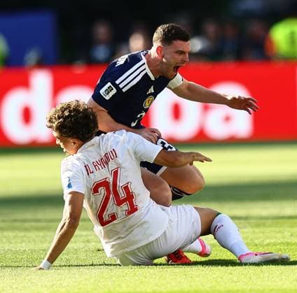 Andy Robertson of Scotland is tackled by Neil El Aynaoui of Morocco Scotland v Morocco, 2026 FIFA World Cup, WM, Weltmeisterschaft, Fussball Group C, Football, Boston Stadium, Foxborough, Massachusetts, USA - 19 Jun 2026Foxborough Boston Stadium Massachusetts (MA) United States of America EDITORIAL USE ONLY No use with unauthorised audio, video, data, fixture lists, club league logos or live services. Online in-match use limited to 120 images, no video emulation. No use in betting, games or single club league player publications.  Copyright: xMichaelxZemanek Shutterstockx 16928953av