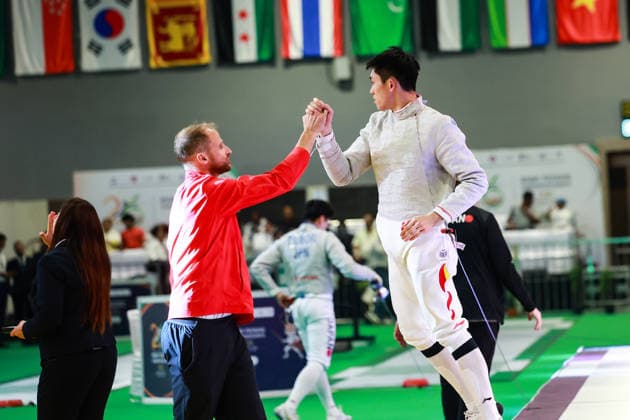 June 19, 2026, New Delhi, Delhi, India: Luo Shaotong (China) celebrates after beating Tsumori Shido (Japan) during Semi-Finals of Asian Senior Fencing Championships 2026 (Men s Sabre) at Bharat Mandapam Convention Centre, New Delhi, India on 19th June 2026. Fencing 2026: Asian Senior Fencing Championships 2026  - ZUMAd207 20260619_zsp_d207_293 Copyright: xAvijitxDasx