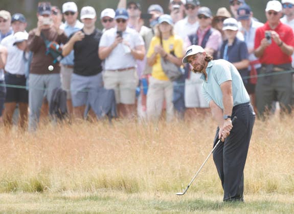 Tommy Fleetwood of England hits out of the rough the 3rd hole in the second round of the 126th U.S. Open Golf Championship at Shinnecock Hills Golf Club in Southampton, NY on Friday, June 19, 2026.  NYC202606191009 JOHNxANGELILLO