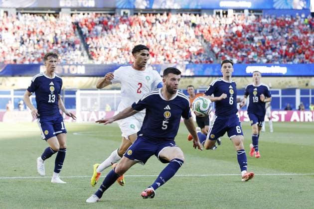 FOXBOROUGH - (LR) Achraf Hakimi of Morocco, Grant Hanley of Scotland during the FIFA 2026 World Cup Group C match between Scotland and Morocco at Boston Stadium on June 20, 2026 in Foxborough, United States. MAURICE VAN STEEN ANP FIFA World Cup, WM, Weltmeisterschaft, Fussball 2026 2026 xVIxANPxSportx xMauricexvanxSteenxIVx 561462557 originalFilename: 561462557.jpg