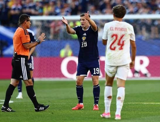 Lewis Ferguson of Scotland complains to the referee Scotland v Morocco, 2026 FIFA World Cup, WM, Weltmeisterschaft, Fussball Group C, Football, Boston Stadium, Foxborough, Massachusetts, USA - 19 Jun 2026Foxborough Boston Stadium Massachusetts (MA) United States of America EDITORIAL USE ONLY No use with unauthorised audio, video, data, fixture lists, club league logos or live services. Online in-match use limited to 120 images, no video emulation. No use in betting, games or single club league player publications.  Copyright: xMichaelxZemanek Shutterstockx 16928953bn