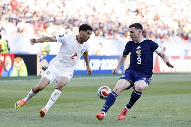FOXBOROUGH - (LR) Achraf Hakimi of Morocco, Andy Robertson of Scotland during the FIFA 2026 World Cup Group C match between Scotland and Morocco at Boston Stadium on June 20, 2026 in Foxborough, United States. MAURICE VAN STEEN ANP FIFA World Cup, WM, Weltmeisterschaft, Fussball 2026 2026 xVIxANPxSportx xMauricexvanxSteenxIVx 561462903 originalFilename: 561462903.jpg