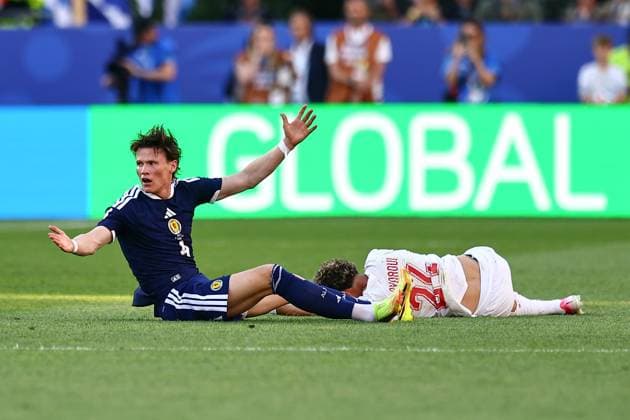 Neil El Aynaoui of Morocco clashes with Scott McTominay of Scotland Scotland v Morocco, 2026 FIFA World Cup, WM, Weltmeisterschaft, Fussball Group C, Football, Boston Stadium, Foxborough, Massachusetts, USA - 19 Jun 2026Foxborough Boston Stadium Massachusetts (MA) United States of America EDITORIAL USE ONLY No use with unauthorised audio, video, data, fixture lists, club league logos or live services. Online in-match use limited to 120 images, no video emulation. No use in betting, games or single club league player publications.  Copyright: xMichaelxZemanek Shutterstockx 16928953bq