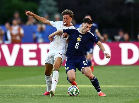 Neil El Aynaoui of Morocco and Kieran Tierney of Scotland Scotland v Morocco, 2026 FIFA World Cup, WM, Weltmeisterschaft, Fussball Group C, Football, Boston Stadium, Foxborough, Massachusetts, USA - 19 Jun 2026Foxborough Boston Stadium Massachusetts (MA) United States of America EDITORIAL USE ONLY No use with unauthorised audio, video, data, fixture lists, club league logos or live services. Online in-match use limited to 120 images, no video emulation. No use in betting, games or single club league player publications.  Copyright: xMichaelxZemanek Shutterstockx 16928953bt