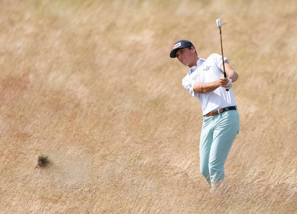 Mason Howell hits out of the fescue on the 18th hole in the second round of the 126th U.S. Open Golf Championship at Shinnecock Hills Golf Club in Southampton, NY on Friday, June 19, 2026.  NYC202606191027 JOHNxANGELILLO