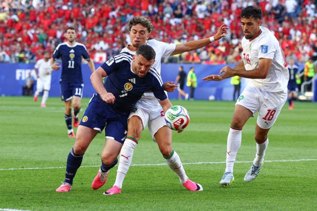 FIFA World Cup, WM, Weltmeisterschaft, Fussball 2026: Scotland v Morocco BOSTON, USA - 19th June 2026: John McGinn of Scotland goes down under the challenge of Neil El Aynaoui of Morocco and claims for a penalty during the FIFA World Cup 2026 Group C match between Scotland and Morocco at Boston Stadium Boston Boston Stadium United States of America Copyright: xCraigxMercerx xPeakxActionxPhotosx