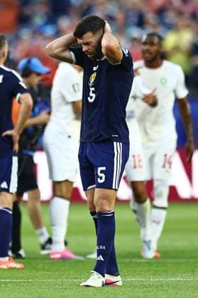 Grant Hanley of Scotland dejected at full time Scotland v Morocco, 2026 FIFA World Cup, WM, Weltmeisterschaft, Fussball Group C, Football, Boston Stadium, Foxborough, Massachusetts, USA - 19 Jun 2026Foxborough Boston Stadium Massachusetts (MA) United States of America EDITORIAL USE ONLY No use with unauthorised audio, video, data, fixture lists, club league logos or live services. Online in-match use limited to 120 images, no video emulation. No use in betting, games or single club league player publications.  Copyright: xMichaelxZemanek Shutterstockx 16928953de