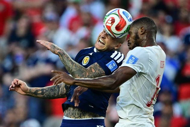 Scotland v Morocco - FIFA World Cup, WM, Weltmeisterschaft, Fussball 2026 - Group C FOXBOROUGH, USA - JUNE 19: Lyndon Dykes of Scotland in action against Issa Diop of Morocco during the 2026 FIFA World Cup First Stage Group C match between Scotland and Morocco at Gillette Stadium (Boston Stadium) in Foxborough, Massachusetts, United States on June 19, 2026. Abdulhamid Hosbas Anadolu Massachusetts United States. Editorial use only. Please get in touch for any other usage.  Copyright: x2026xAnadoluxAbdulhamidxHosbasx