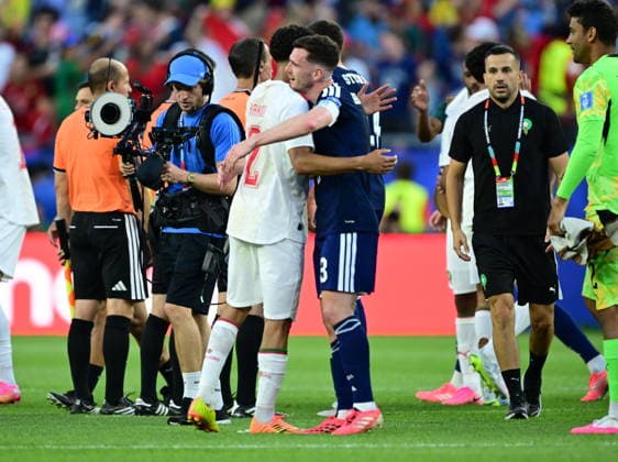 Scotland v Morocco - FIFA World Cup, WM, Weltmeisterschaft, Fussball 2026 - Group C FOXBOROUGH, USA - JUNE 19: Moroccan player Achraf Hakimi greets Andy Robertson of Scotland after the 2026 FIFA World Cup First Stage Group C match between Scotland and Morocco at Gillette Stadium (Boston Stadium) in Foxborough, Massachusetts, United States on June 19, 2026. Abdulhamid Hosbas Anadolu Massachusetts United States. Editorial use only. Please get in touch for any other usage.  Copyright: x2026xAnadoluxAbdulhamidxHosbasx