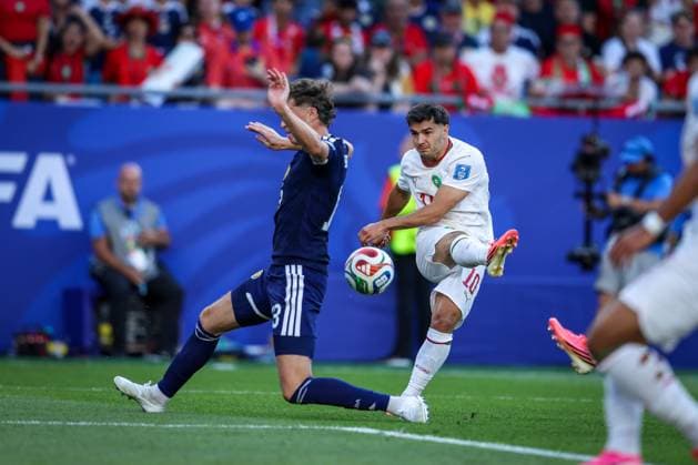 Scotland v. Morocco 19 June 2026 BOSTON Boston Stadium USA BOSTON, UNITED STATES JUNE 19, 2026:Morocco forward Brahim Diaz ( 10) shoots while challenged by Scotland defender Jack Hendry ( 13) during the FIFA World Cup, WM, Weltmeisterschaft, Fussball 2026 Group C match between Morocco and Scotland in Boston, United States, on June 19, 2026 Boston United States of America Copyright: x xAymanxArefxMohamedxSaadxElxDinx xJNAxPressx