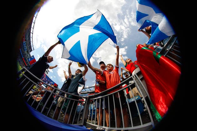 June 19, 2026; Foxborough, Massachusetts, USA; A young Scotland supporter waves a flag ahead of a FIFA World Cup, WM, Weltmeisterschaft, Fussball 2026 Group C match between Scotland and Morocco at Boston Stadium. (c) CSM - ZUMAc04_ 20260619_zma_c04_045 Copyright: xBurtxGranofskyx