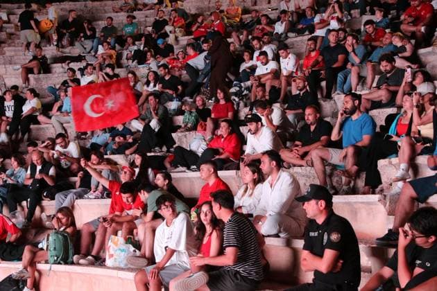 Football fans gather at ancient theater to watch Turkiye-Paraguay match ANTALYA, TURKIYE - JUNE 20: Football fans begin taking their seats at the 2,000-year-old Antiphellos Ancient Theatre to watch Turkiye s 2026 FIFA World Cup, WM, Weltmeisterschaft, Fussball match against Paraguay on a giant screen, in Kas district of Antalya, Turkiye, on June 20, 2026. Talip Demirci Anadolu Antalya Turkey. Editorial use only. Please get in touch for any other usage.  Copyright: x2026xAnadoluxTalipxDemircix