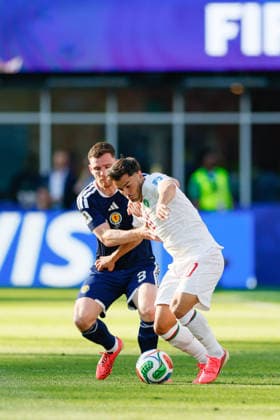 June 19, 2026; Foxborough, Massachusetts, USA; Scotland defender Andy Robertson (3) holds onto Morocco forward Brahim Diaz (10) during a FIFA World Cup, WM, Weltmeisterschaft, Fussball 2026 Group C match between Scotland and Morocco at Boston Stadium. (c) CSM FIFA World Cup 2026: Scotland Vs Morocco JUN 19  - ZUMAc04_ 20260619_zma_c04_066 Copyright: xBurtxGranofskyx