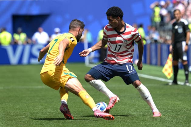 June 19, 2026, Seattle, Washington, United States: Mathew Leckie (L) of Australia men football team and Malik Tillman (R) of United States men football team seen in action during the FIFA World Cup, WM, Weltmeisterschaft, Fussball 2026 first stage Group D match between USA and Australia held at the Seattle Stadium. Final score; USA 2:0 Australia. FIFA World Cup 2026 United States Vs Australia Held At The Seattle Stadium In Seattle, USA -19 Jun 2026  - ZUMAs197 20260619_aaa_s197_247 Copyright: xLuisxVeniegrax