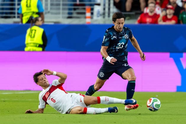 SANTA CLARA, CA - JUNE 19: Arda Guler 8 of Turkiye dives for the ball against Matias Galarza 23 of Paraguay during the FIFA World Cup, WM, Weltmeisterschaft, Fussball 2026 Group D match between Turkiye and Paraguay on June 19, 2026 at San Francisco Bay Area Stadium in Santa Clara, CA. (Photo by Matthew Huang Icon Sportswire) SOCCER: JUN 19 FIFA World Cup 26 Group D - Turkiye vs Paraguay EDITORIAL USE ONLY Icon260619004