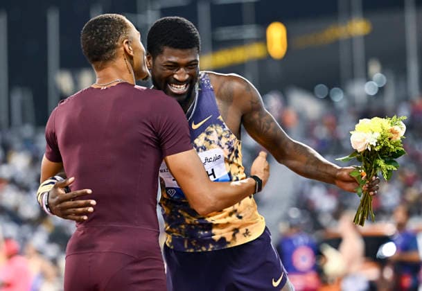 Doha Diamond League 2026 Cordell Tinch (R) of the United States celebrates after winning the men s 110m Hurdles final at the Diamond League Doha Meeting 2026 competition at Suheim Bin Hamad Stadium in Doha, Qatar, on May 19, 2026. DOHA Qatar Copyright: xNOUSHADx