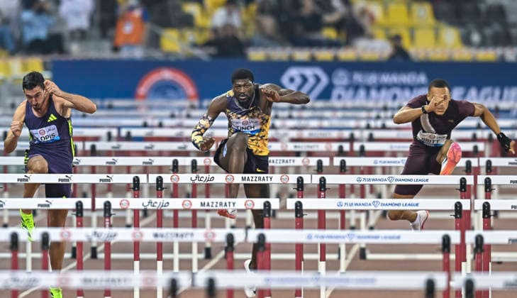 Doha Diamond League 2026 Cordell Tinch (C) of the United States competes in the men s 110m Hurdles final at the Diamond League Doha Meeting 2026 competition at Suheim Bin Hamad Stadium in Doha, Qatar, on May 19, 2026. DOHA Qatar Copyright: xNOUSHADx