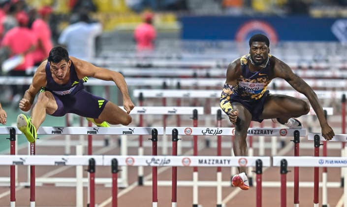 Doha Diamond League 2026 Cordell Tinch (R) of the United States competes in the men s 110m Hurdles final at the Diamond League Doha Meeting 2026 competition at Suheim Bin Hamad Stadium in Doha, Qatar, on May 19, 2026. DOHA Qatar Copyright: xNOUSHADx