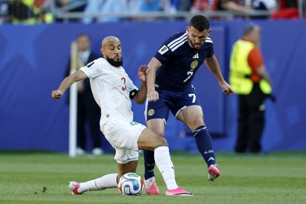 FOXBOROUGH - (LR) Noussair Mazraoui of Morocco, John McGinn of Scotland during the FIFA 2026 World Cup Group C match between Scotland and Morocco at Boston Stadium on June 20, 2026 in Foxborough, United States. MAURICE VAN STEEN ANP FIFA World Cup, WM, Weltmeisterschaft, Fussball 2026 2026 xVIxANPxSportx xMauricexvanxSteenxIVx 561485769 originalFilename: 561485769.jpg
