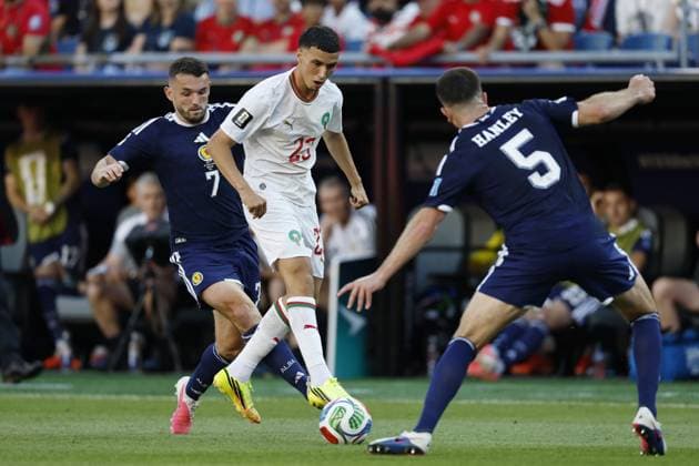 FOXBOROUGH - (LR) John McGinn of Scotland, Bilal el Khannouss of Morocco, Grant Hanley of Scotland during the 2026 FIFA World Cup, WM, Weltmeisterschaft, Fussball Group C match between Scotland and Morocco at Boston Stadium on June 20, 2026 in Foxborough, United States. MAURICE VAN STEEN ANP FIFA World Cup 2026 2026 xVIxANPxSportx xMauricexvanxSteenxIVx 561485778 originalFilename: 561485778.jpg
