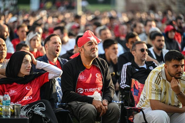 Fans gather at Yedikule Fortress to watch Turkiye-Paraguay World Cup match ISTANBUL, TURKIYE - JUNE 20: Football fans gather wearing jerseys and waving Turkish flags at the historic Yedikule Fortress where a giant screen is set up for supporters to watch Turkiye’s 2026 FIFA World Cup, WM, Weltmeisterschaft, Fussball Group D match against Paraguay, in Fatih district of Istanbul, Turkiye, on June 20, 2026. Saffet Azak Anadolu Istanbul Turkey. Editorial use only. Please get in touch for any other usage.  Copyright: x2026xAnadoluxSaffetxAzakx