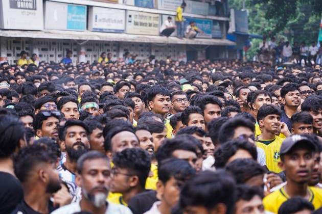 June 20, 2026, Dhaka, Dhaka, Bangladesh: Dhaka, Bangladesh, June 20, 2026: Football fans gather at the Teacher-Student Centre (TSC) of the University of Dhaka to watch the FIFA World Cup, WM, Weltmeisterschaft, Fussball match between Brazil and Haiti on a giant screen in Dhaka, Bangladesh. Thousands of supporters wearing Brazil s yellow and green colors cheered, waved flags, and celebrated throughout the match, creating a festive atmosphere at the venue. Following the game, jubilant fans took part in celebrations and victory processions, reflecting the enduring passion for football among Bangladeshi supporters. Dhaka Bangladesh - ZUMAk185 0859594155st Copyright: xRubelxKarmakerx