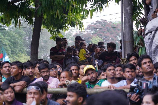 June 20, 2026, Dhaka, Dhaka, Bangladesh: Dhaka, Bangladesh, June 20, 2026: Football fans gather at the Teacher-Student Centre (TSC) of the University of Dhaka to watch the FIFA World Cup, WM, Weltmeisterschaft, Fussball match between Brazil and Haiti on a giant screen in Dhaka, Bangladesh. Thousands of supporters wearing Brazil s yellow and green colors cheered, waved flags, and celebrated throughout the match, creating a festive atmosphere at the venue. Following the game, jubilant fans took part in celebrations and victory processions, reflecting the enduring passion for football among Bangladeshi supporters. Dhaka Bangladesh - ZUMAk185 0859594163st Copyright: xRubelxKarmakerx